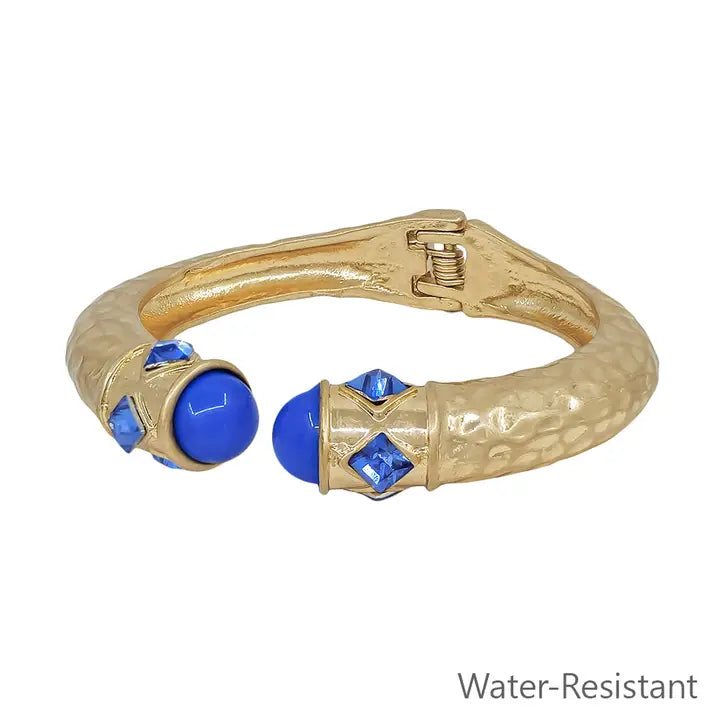 Water Resistant Matte Gold with Blue Crystal Accents Hinged Bracelet