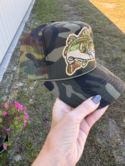 The BK Sequin Bass Camo Trucker Hat